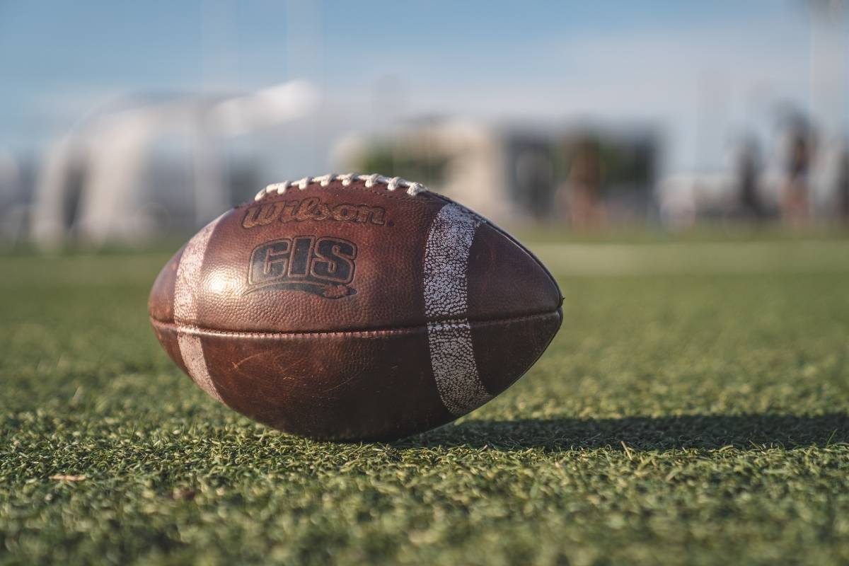 A printed American football is kept on the field