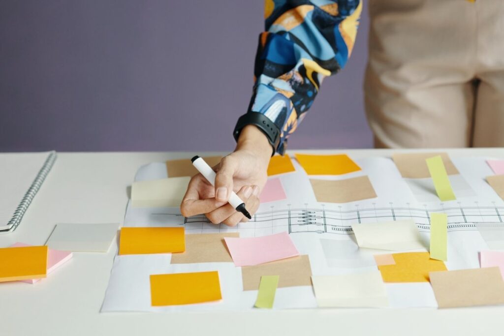 A woman uses a custom sticker while planning her project