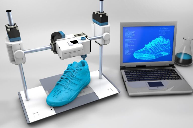 A 3d printed shoe kept on a machine with its design on laptop